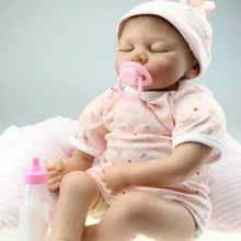 22 дюймов 55 см магнитный рот возрождается кукла мягкого силикона реалистичного игрушки подарок для детей рождественский подарок спальные розовые шляпа
