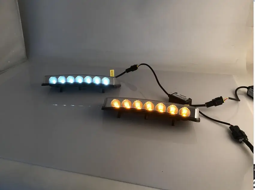 

Qirun led drl daytime running light for Nissan 2003-2005 with yellow turn signals and blue night running light