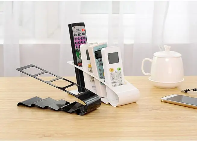 

1PC New 4 Frame Remote Control Storage Practical Mobile Phone Holder Stand Iron Newest White Black Organizer Case OK 0989