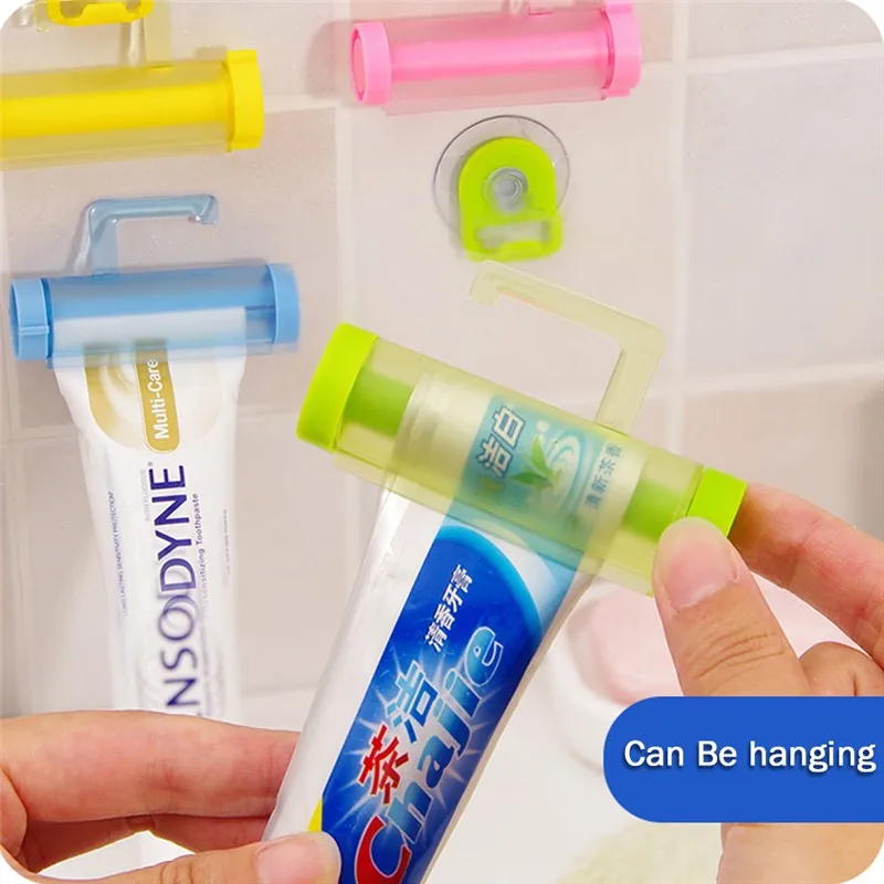 

1pcs Toothpaste Squeezer Extruder Rolling Toothpaste Facial cleanser Sucker Hook Holder Toothpaste Tube Squeezer Dispenser