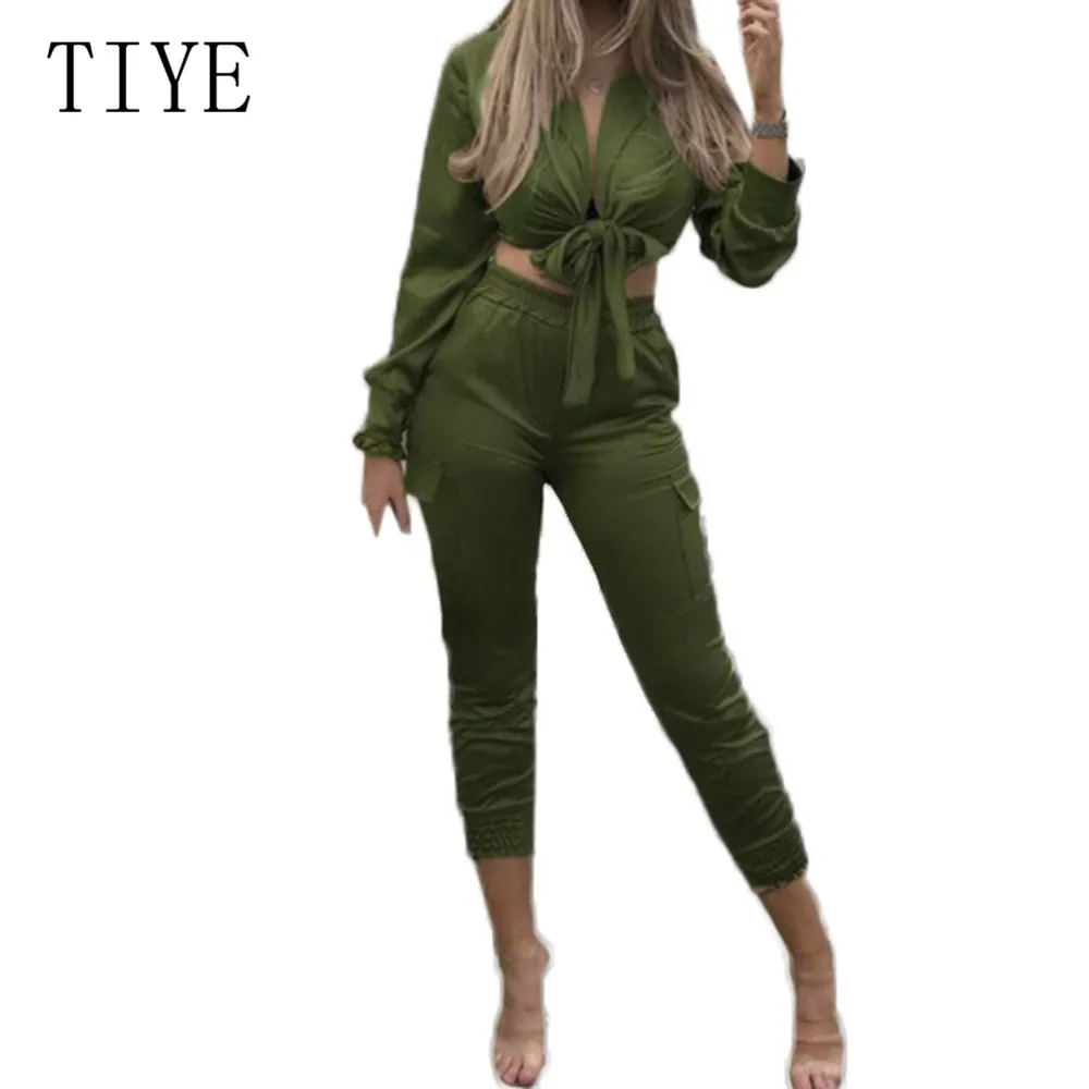 TIYE Elegant Satin Bodycon Bandage Jumpsuit Women 2019 Autumn Long Sleeve Solid Lapel Deep V Neck Pockets Playsuits Streetwear TIYE Elegant Satin Bodycon Bandage Jumpsuit Women 2019 Autumn Long Sleeve Solid Lapel Deep V Neck Pockets Playsuits Streetwear