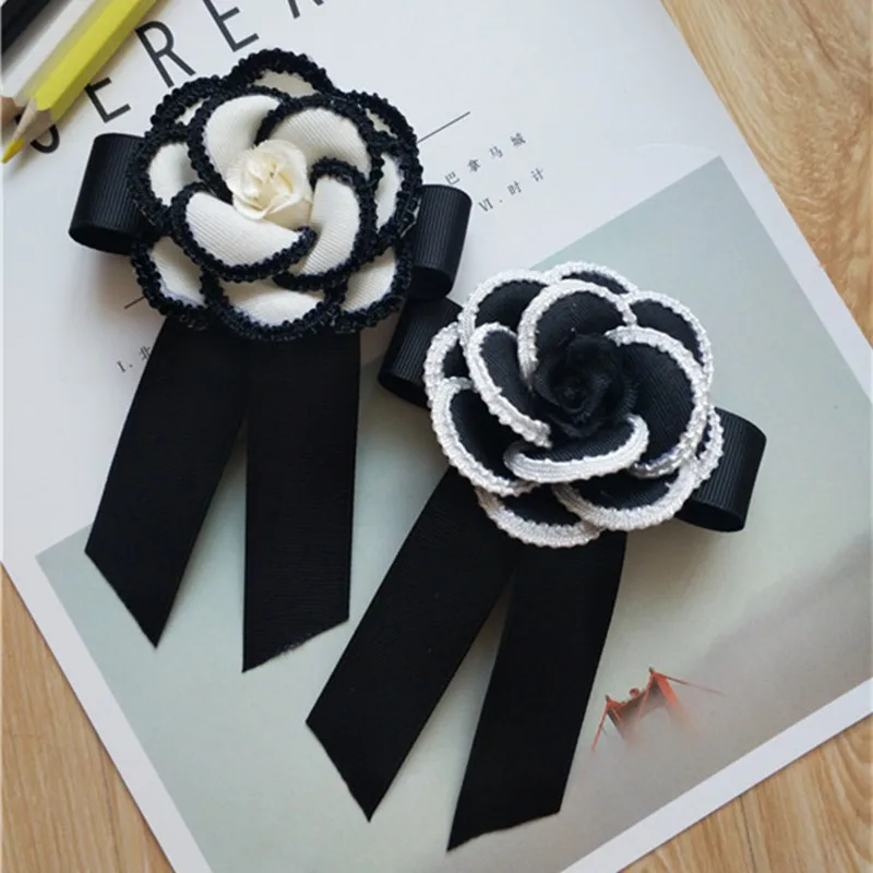 

CX-Shirling 7cm Diameter Fabrc Camellia Flower Brooch Black White Fabric Camellia Flower Ribbon Bowknot Brooches Female