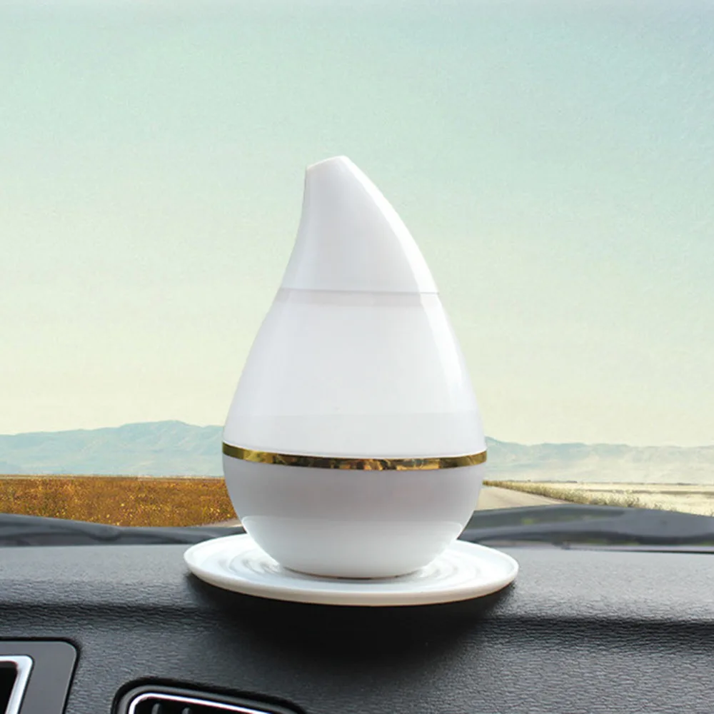 

Drop-shaped Mini Car USB Air Purifier Humidifier Aromatherapy Atomizer.Drop-shaped MiniAir Purifier