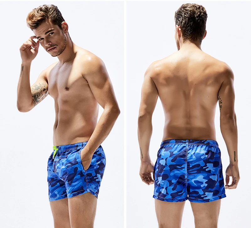 do esporte dos homens board shorts praia