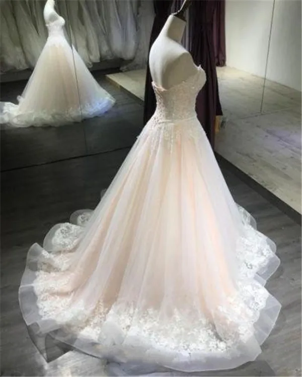blush-pink-wedding-dresses-a-line-sweetheart-strapless-sleeveless-sweep-train-applique-sequins-lace-2019-beach-boho-wedding-bridal-gowns (1)