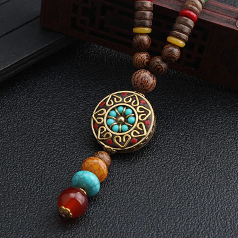 

2019 New Round Plate Nepal Flower Pendant Ethnic Necklace Egypt Elephant Necklace Coconut Beads Necklace Sweater Necklaces