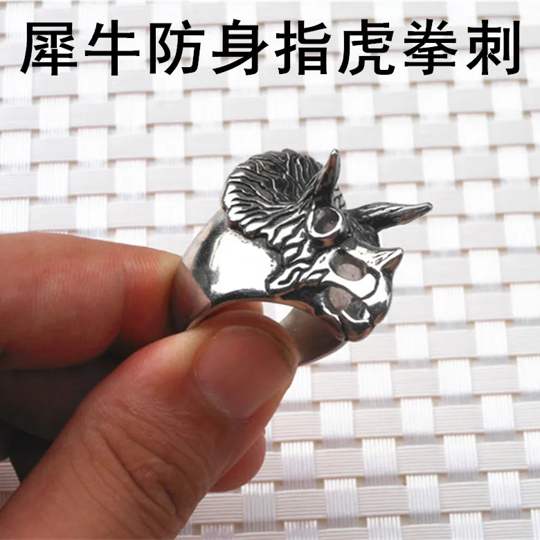 Self defense button ring punch stab boxing gloves refers toglove