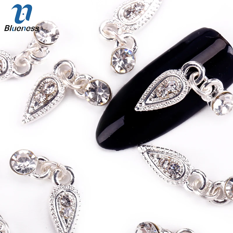 

Blueness 10 Pcs/Lot Crystal Pendant Studs For Nails Charms 3D Metal Chain Water Droplets Nail Art Rhinestones Decorations TN1704