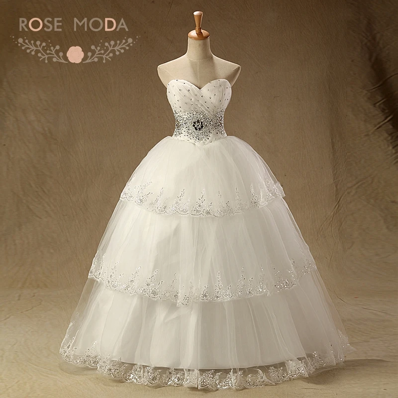 

Rose Moda Tiered Skirt Crystal Princess Quinceanera Dresses White Ivory Debutante Dresses with Ball Skirt for Age 18