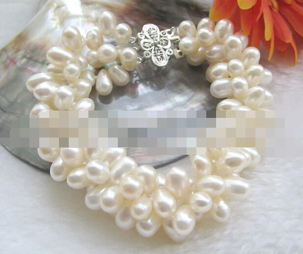 

FREE SHIPPING>>>@@ > 09470 3row white freshwater pearl bracelet - GP clasp
