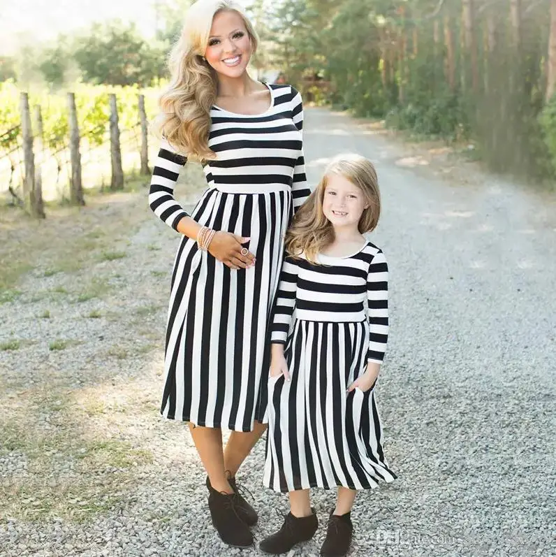 couple mom and kid dress