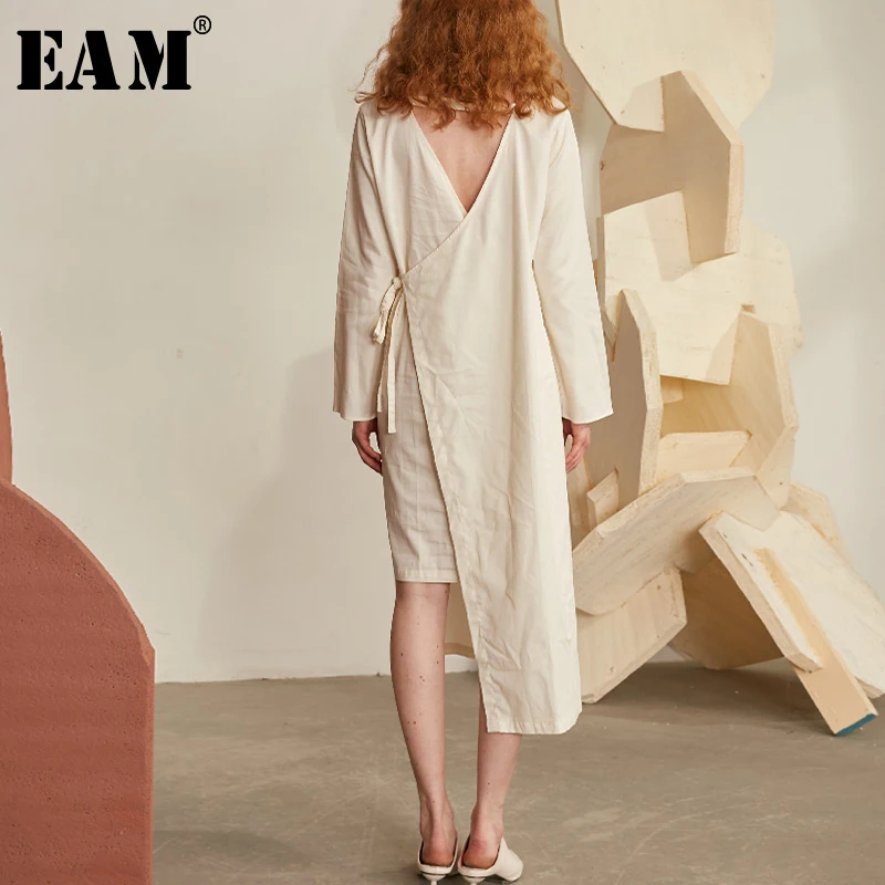 

[EAM] 2019 New Spring Summer Round Neck Full Sleeve Hollow Out Bandage Irregular Personality Dress Women Fashion Tide JX178