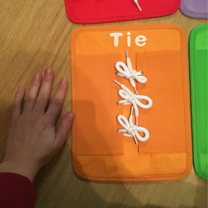 Montessori-Sensorial-Material-Preskool-Learning-Wear-Zipper-Snaps-Button-Board-Buckle-Toy-Preschool-Training-Kids-Teaching-Aids-02