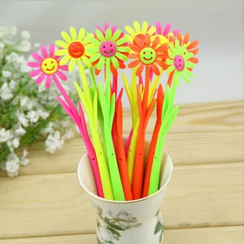 

10pcs/lot Creative candy color smile flower Ballpoint pen Cute Ball point pen Roll gift pens Office & School Supplies G018