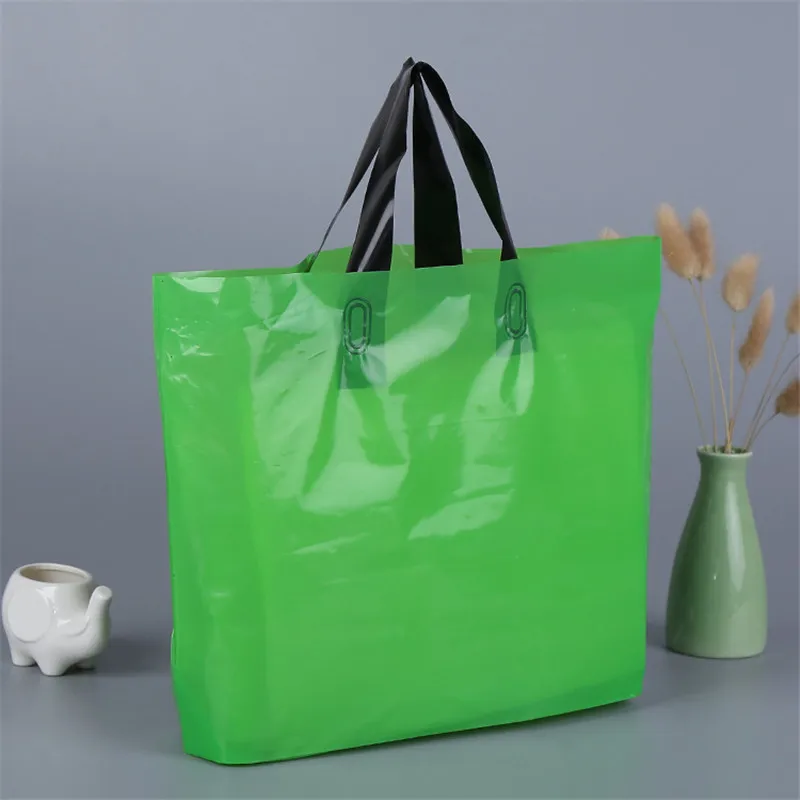 500pcs-lot-custom-logo-printed-plastic-packing-shopping-bags-with-handle-customized-garment-clothing-gift-packaging (3)