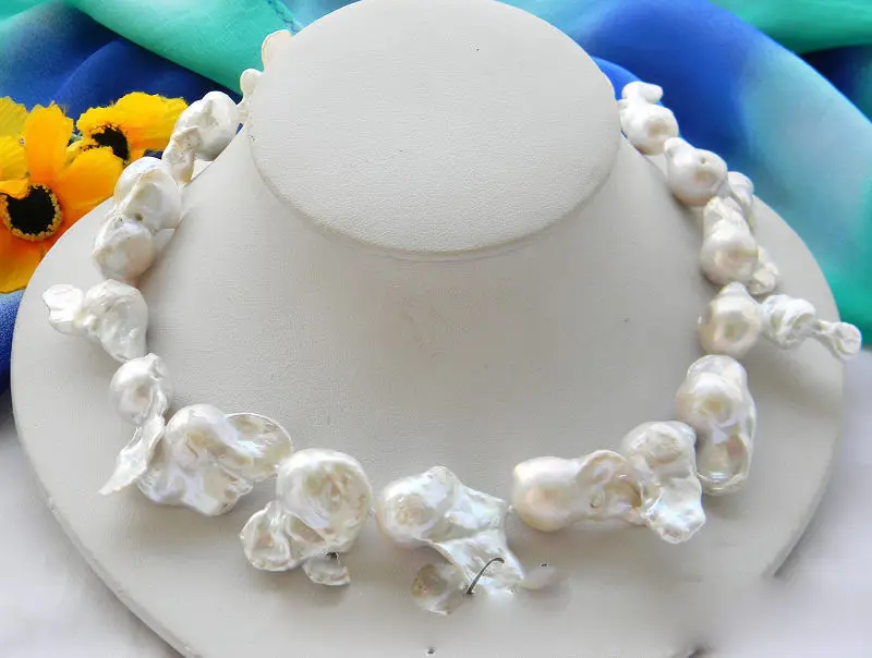 

HUGE 16" 35MM WHITE BAROQUE KESHI REBORN PEARL NECKLACE 5.27