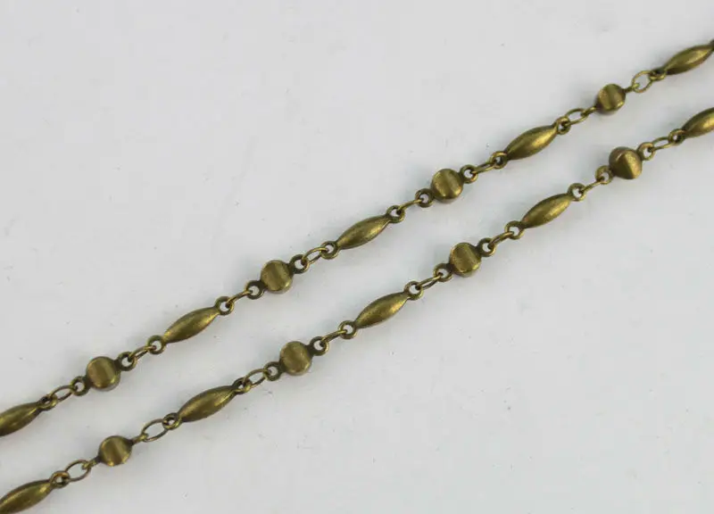 

1 Meter of Antiqued bronze stick and ball link handmade chain #22909
