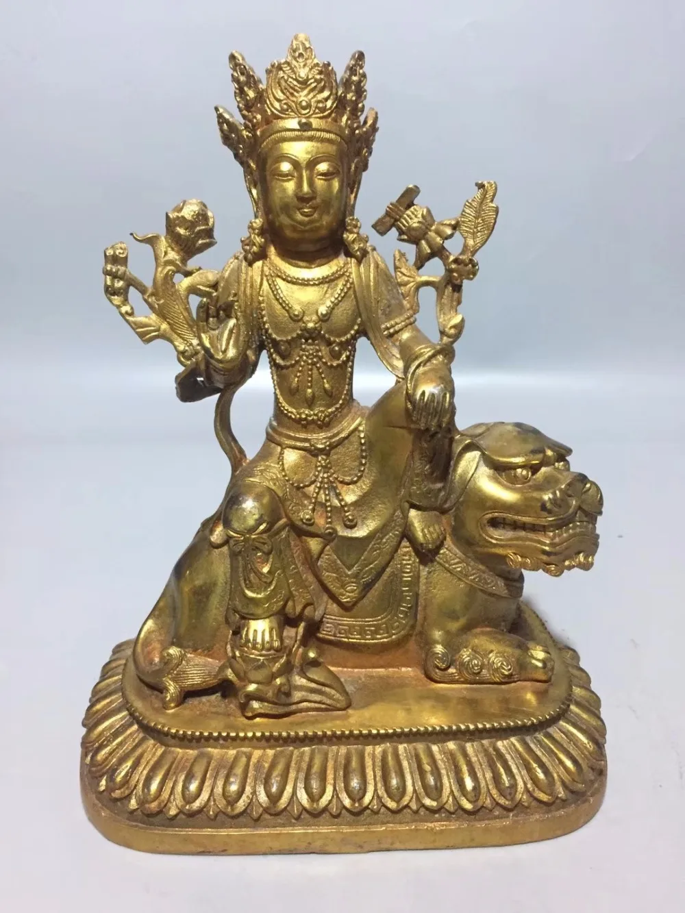

SNS Chinese hand carved gilt lion buddha sculpture