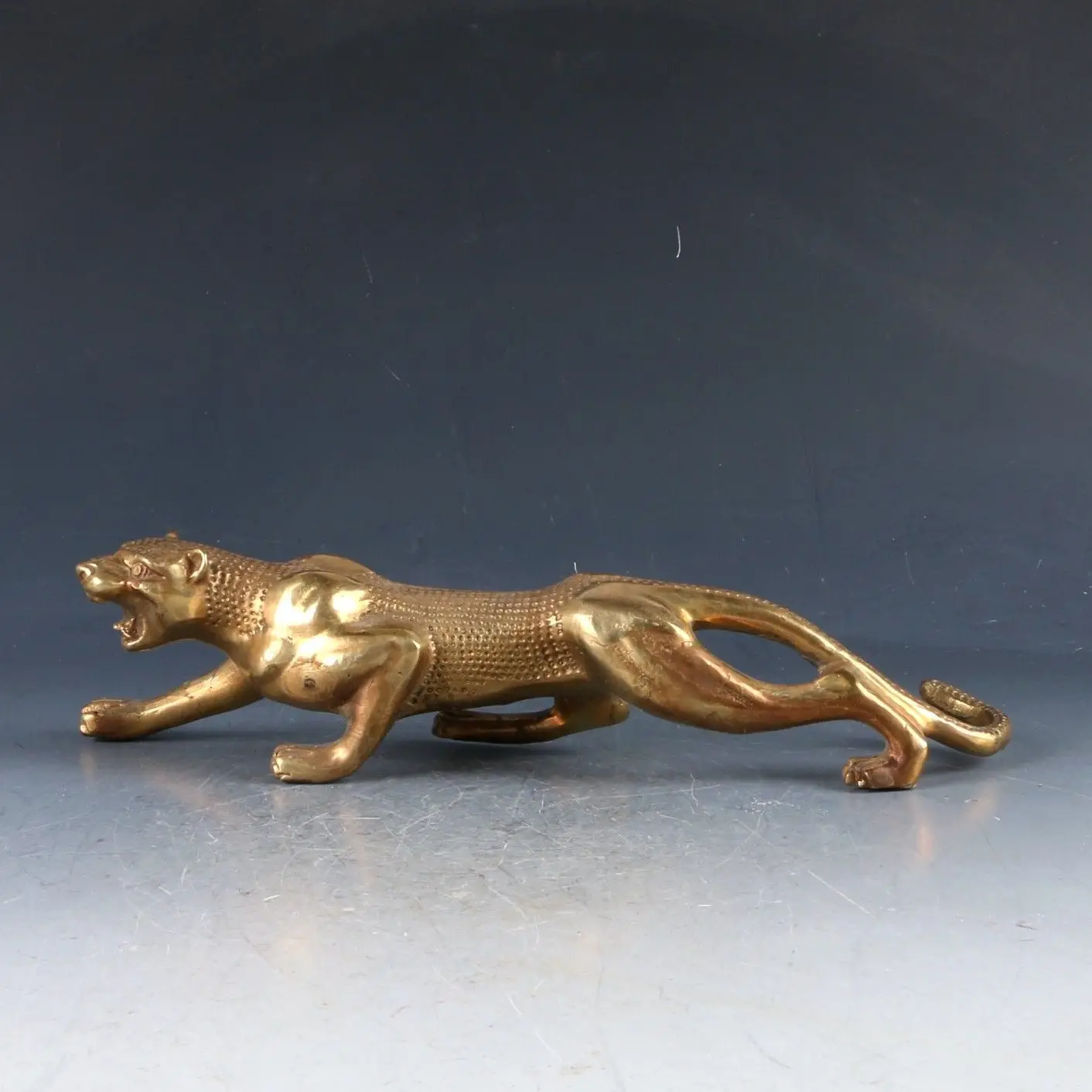 

Chinese Brass Handwork Carved leopard Statue