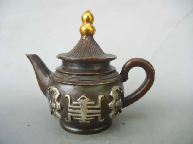 

The qing dynasty in ancient China to collect gold copper bat gourd cover the pot