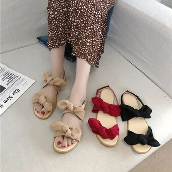 

2019 summer new wild bow flat-bottom Roman word with sandals female