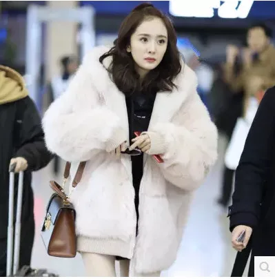 

Women medium-long pink with a hood fox fur coat