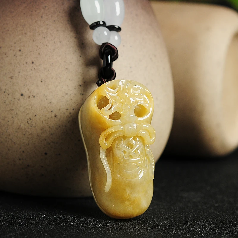 

Delicately carved yellow jade small shoes spider Genuine A goods meaning contentment Changle pendant item pendant