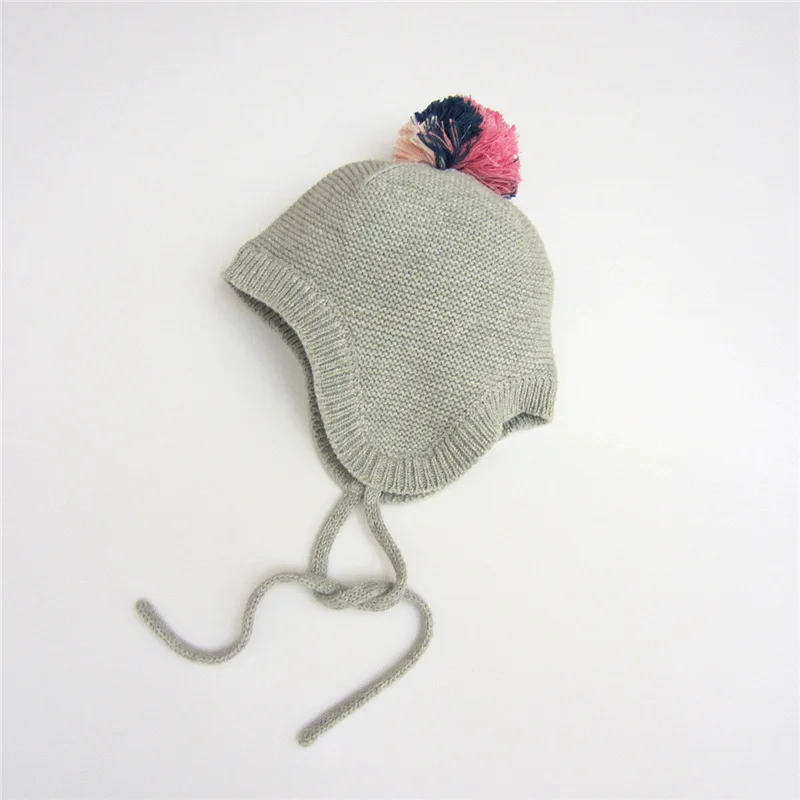 

Foreign trade of the original single synchronized three - color ball gray inverted needle thin ear cap fashion spring baby hats