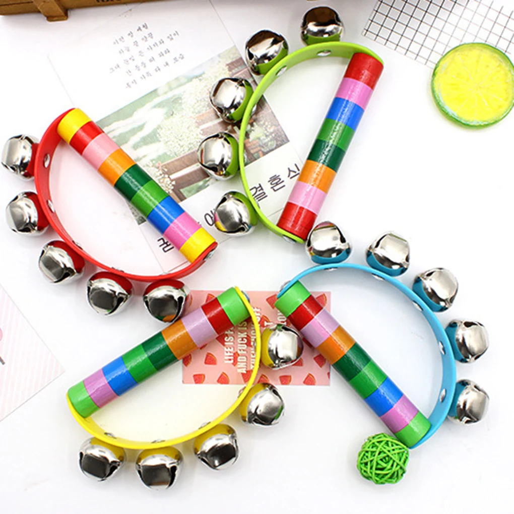

1pc Wooden Stick Jingle Bells Cartoon Cute Metal Hand Shake Sound Bell Rattles Baby Kid Children Educational Toy Random Color