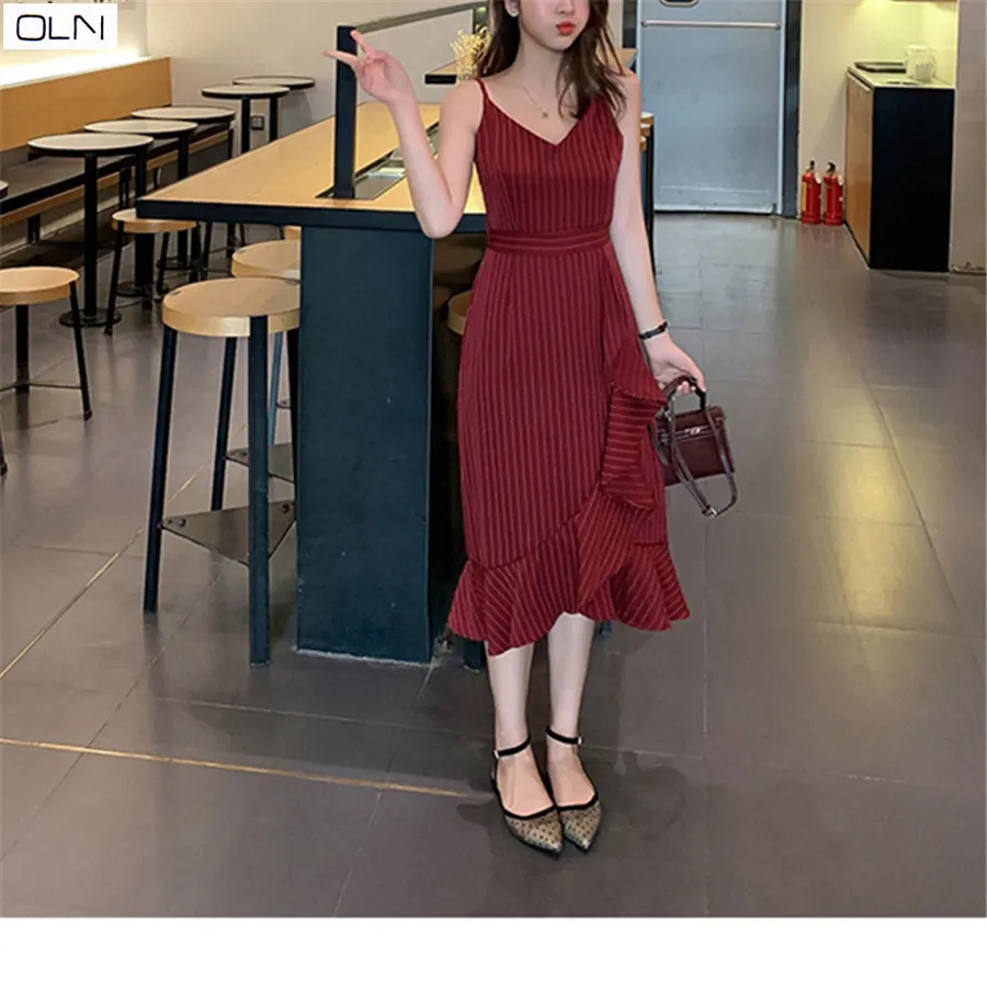 

Spring and summer Korean version of the new striped asymmetric ruffled suspender Slim was thin dress for women