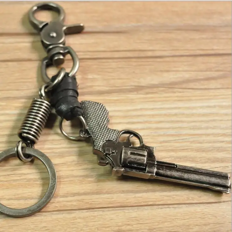 hot Classic Genuine Leather Revolver Pistol Weapon fashion Model Keychain Key Rings New Mini Gun key Chain For Men Jewelry Gift hot Classic Genuine Leather Revolver Pistol Weapon fashion Model Keychain Key Rings New Mini Gun key Chain For Men Jewelry Gift