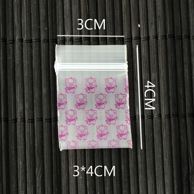 

1000Pcs 3x4cm / 0.84inch x1.57inch Pink pig pattern Jewelry Pill Pearl Powder Hermetic Bag Zip Lock Plastic Gift Packaging Bags