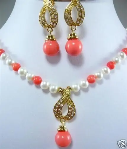 

Free shipping7-8MM White Akoya Cultured Pearl /Pink Coral Necklace Earring Set AAA