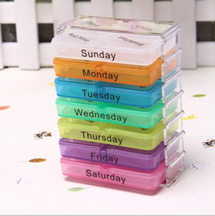 a plastic Weekly Pill Organizers travel medicine organizer drop