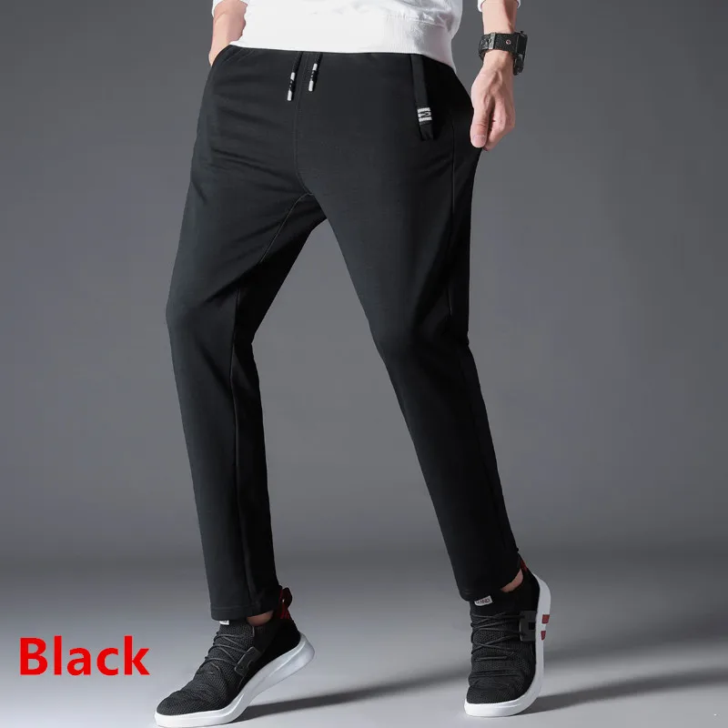 Мужские хлопчатобумажные спортивные брюки для бега свободные прямые Повседневные Дышащие Брюки 6XL плюс удобрения для увеличения спортивные штаны для фитнеса - Цвет: Черный