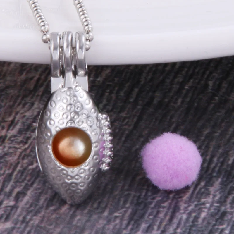 

Silver Football shape pearl Cage Locket Pendant Jewelry DIY Aromatherapy Essential Oil Diffuser Box For Oyster Pearl