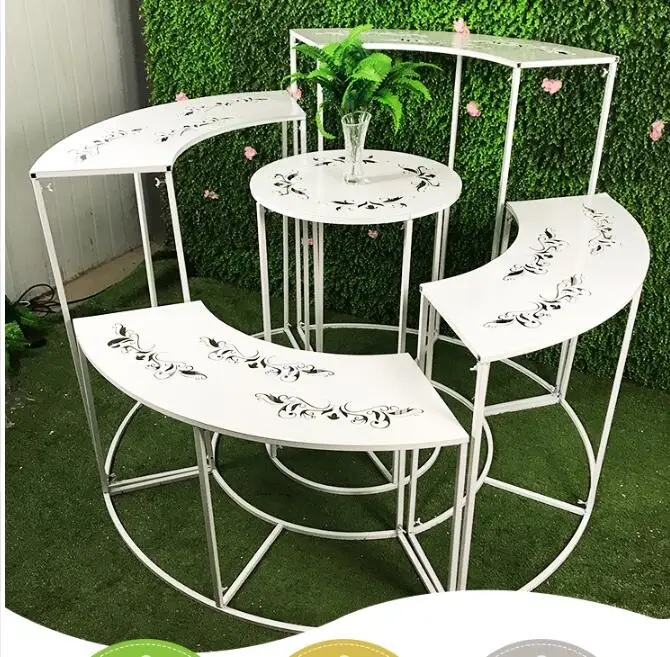 

New wedding props wedding iron dessert table set of five pieces of the welcoming area carved flowers placed pieces of cake rack.