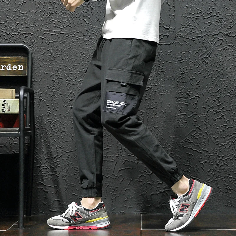 

The new spring 2018 spring/summer fashion Japanese department men's pure color big size baggy trend teenagers' feet casual pants