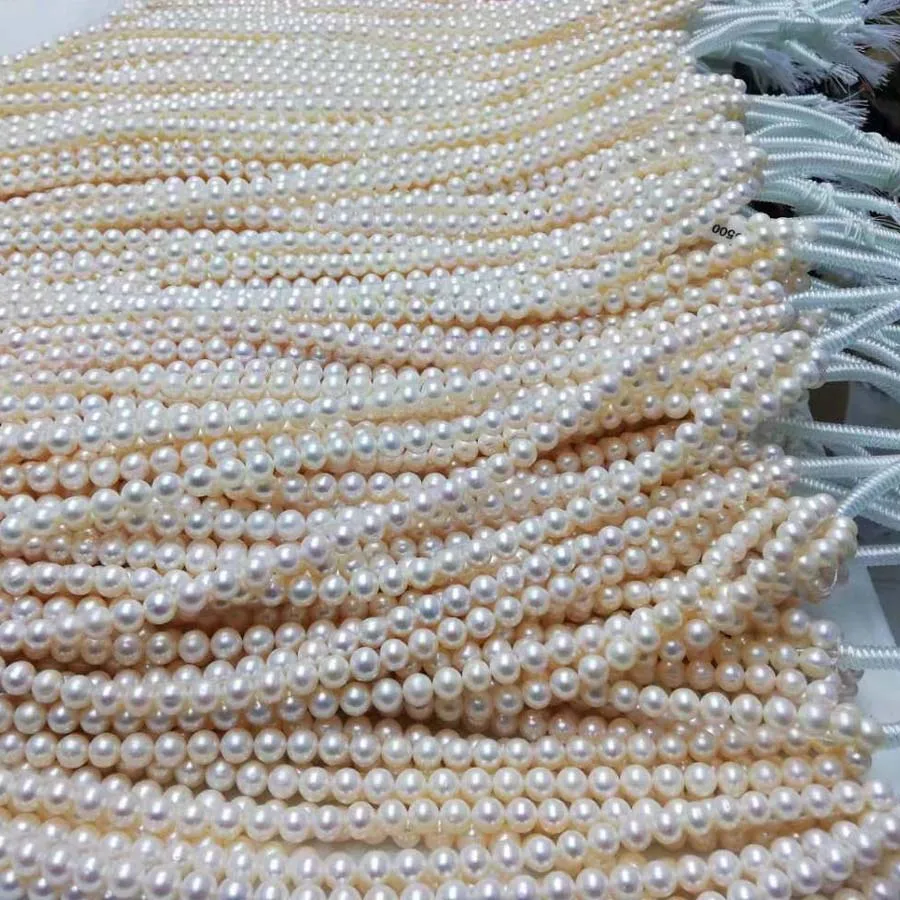 

AA wholelesale 10 strings 9-10mm near round freshwater pearl lots