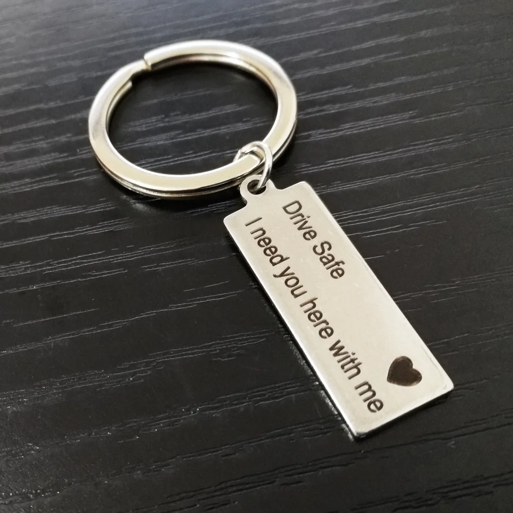 

1Pcs Car Driving Drive Safe I Need You Here with Me Creative Letter Couple Keychain