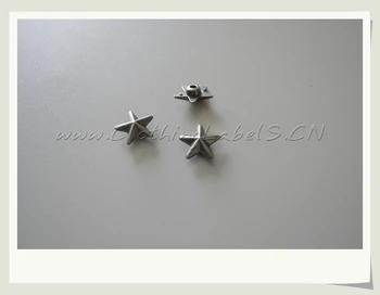 

Custom metal labels for clothing, shoes, bags etc., star studs, rivets for decoration accessories, as custom design