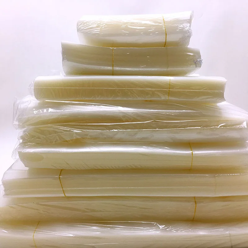 

100pcs/lot Vacuum Bag Food Vacuum Sealer Food Storage Bag for Food Preservation 25 Silk Packaging Bags Home Commercial