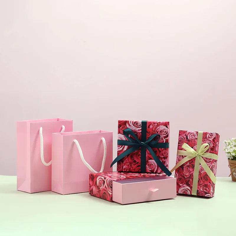 

Beautiful birthday ladies perfume lipstick leather belt gift packing rose pink red box handle bag with ribbon rafi paper