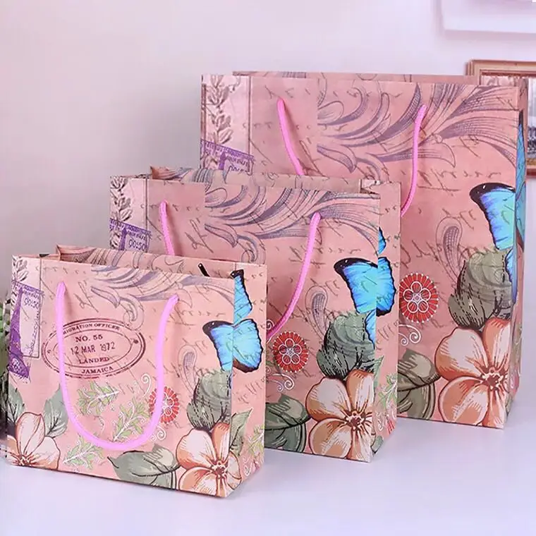 

Emerra Hot Selling Butterfly and flower Gift Bag Candy hand-held paper bag kids toys Clothing Packaging Wholesale Free Shipping
