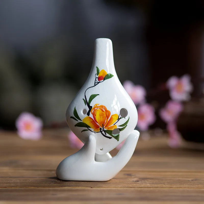 

6 hole ocarina alto C flower pattern Intonation is stable beautiful timbre With case