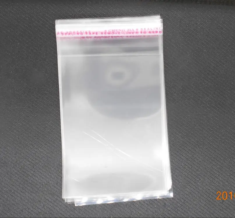 

Hot New 100 PCs Clear Self Adhesive Seal Plastic Bags Trinket Transparent Bags 6x4cm