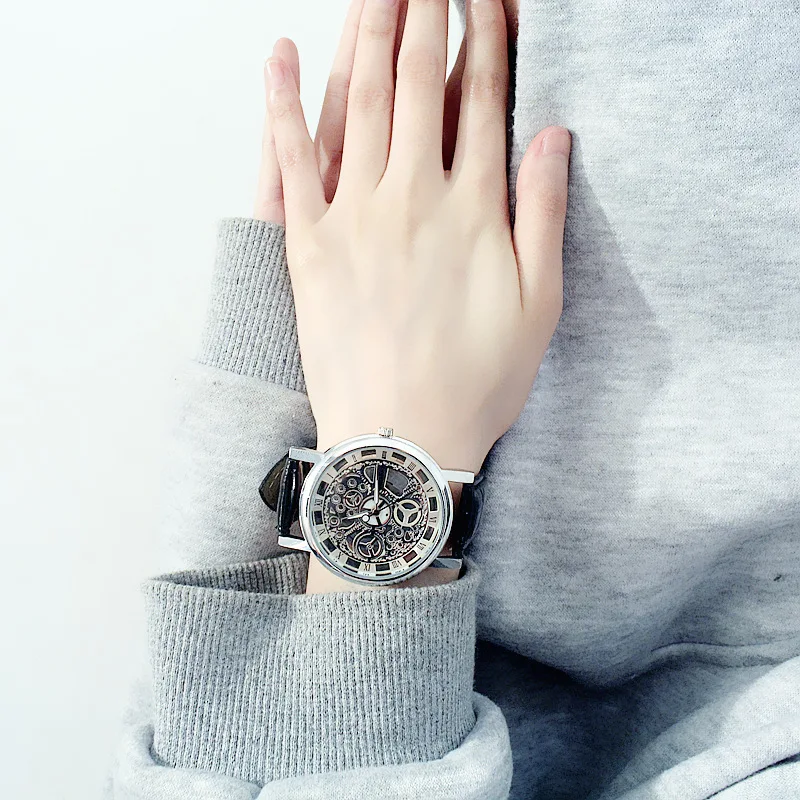 

Fashion tide men's watches waterproof true belt double-sided hollow non-mechanical female student quartz couple watches