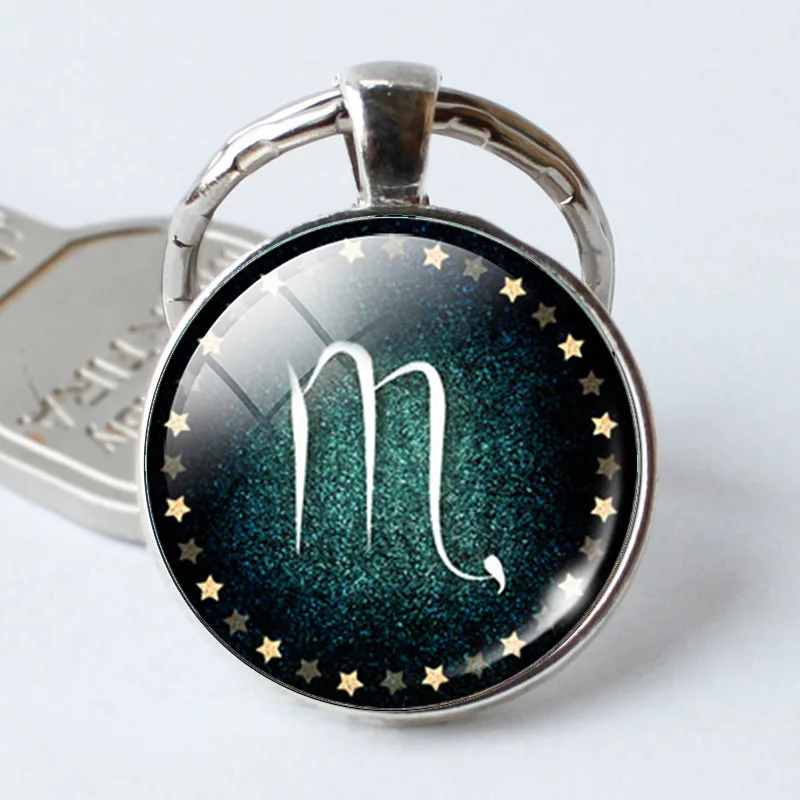 

NEW WOMEN MEN 12 Constellation Leo Virgo Libra Scorpio Keychain Glass Cabochon Pendant Zodiac Sign Key Chain Rings Bag Pendant