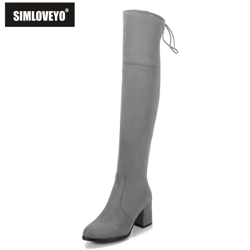 block heel stretch knee high boots