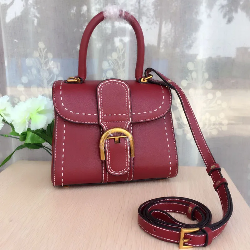 Simple and fresh women leather handbags fashion star with the cover of the outer seam white line horseshoe buckle women bag